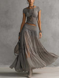 Set Top in Pizzo Grigio e Gonna Maxi Plissettata