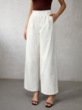 Pantalones de tiro alto Zhamira